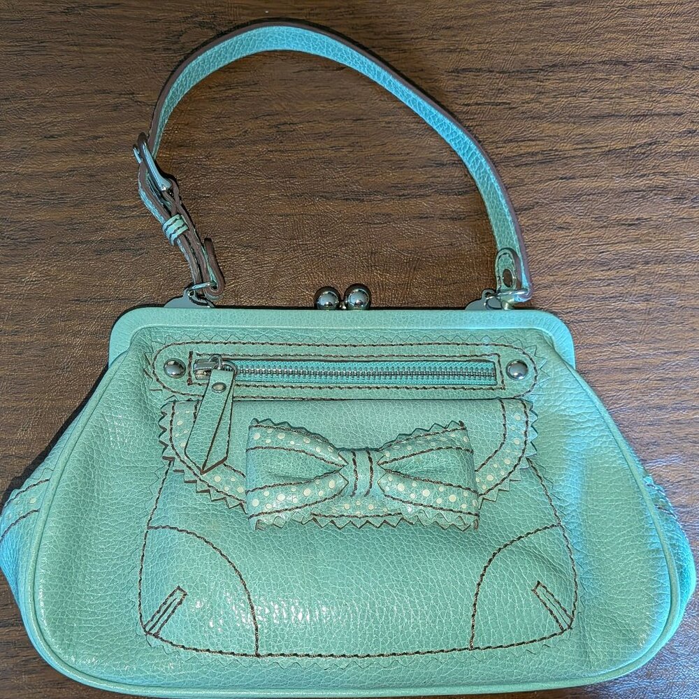 Isabella Fiore Y2K Mint Green Bow Clutch with Silver Hardware.